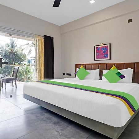 Treebo Grand Vistara Airport Suites Kochi Екстериор снимка