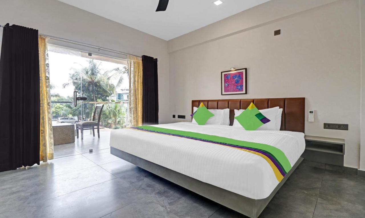 Treebo Grand Vistara Airport Suites Kochi Екстериор снимка