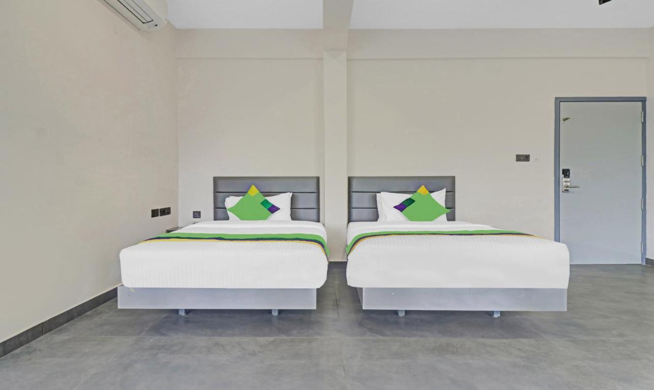 Treebo Grand Vistara Airport Suites Kochi Екстериор снимка