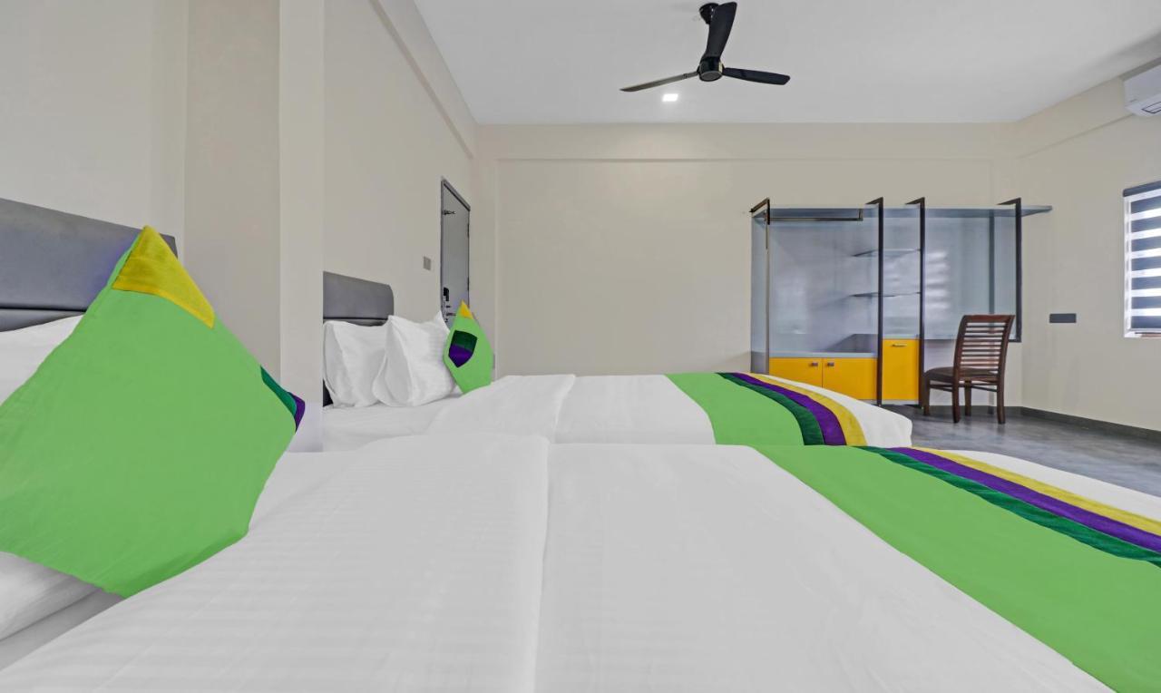 Treebo Grand Vistara Airport Suites Kochi Екстериор снимка